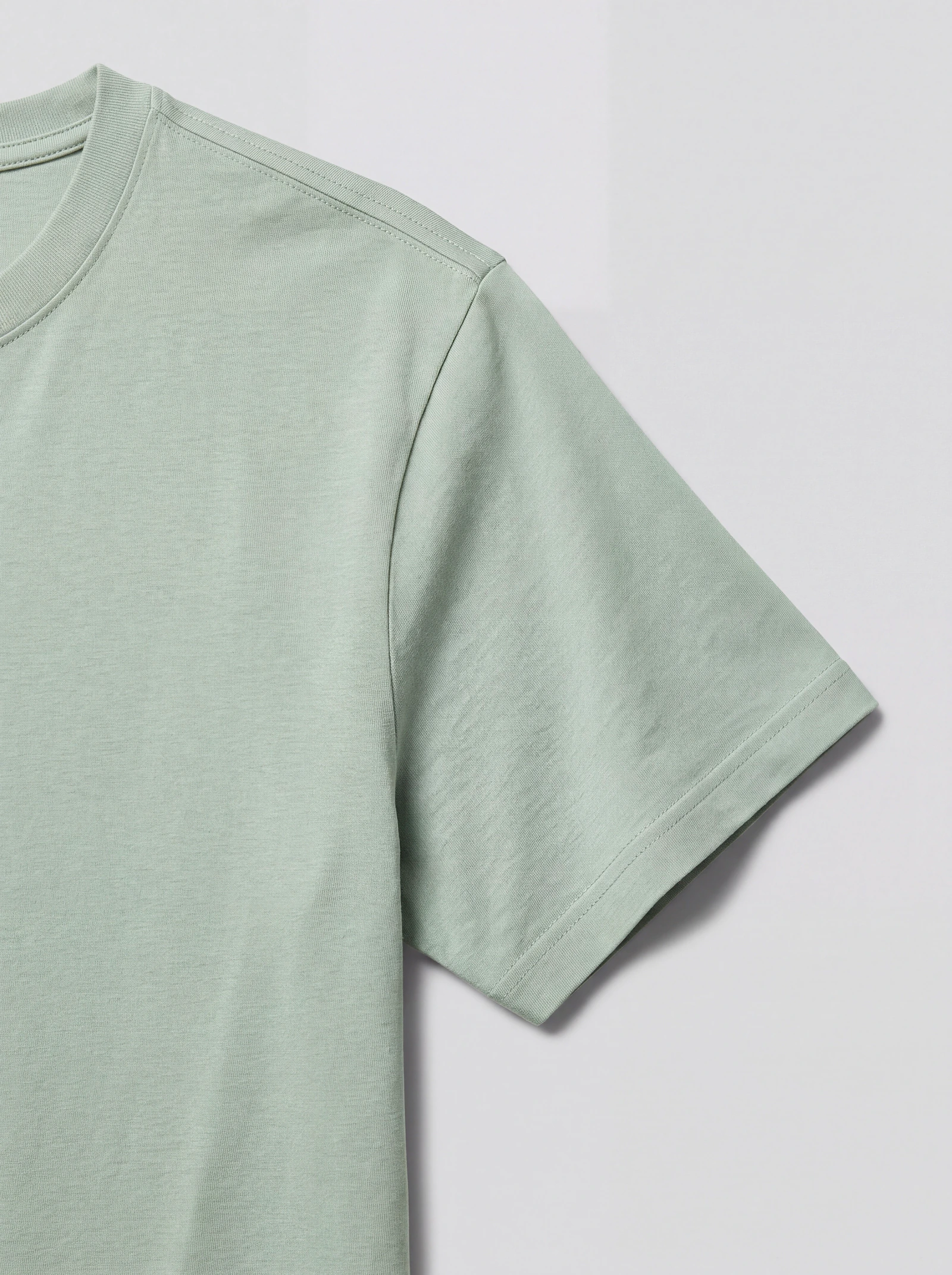 Camiseta Clásica Verde Agua — detalle: manga