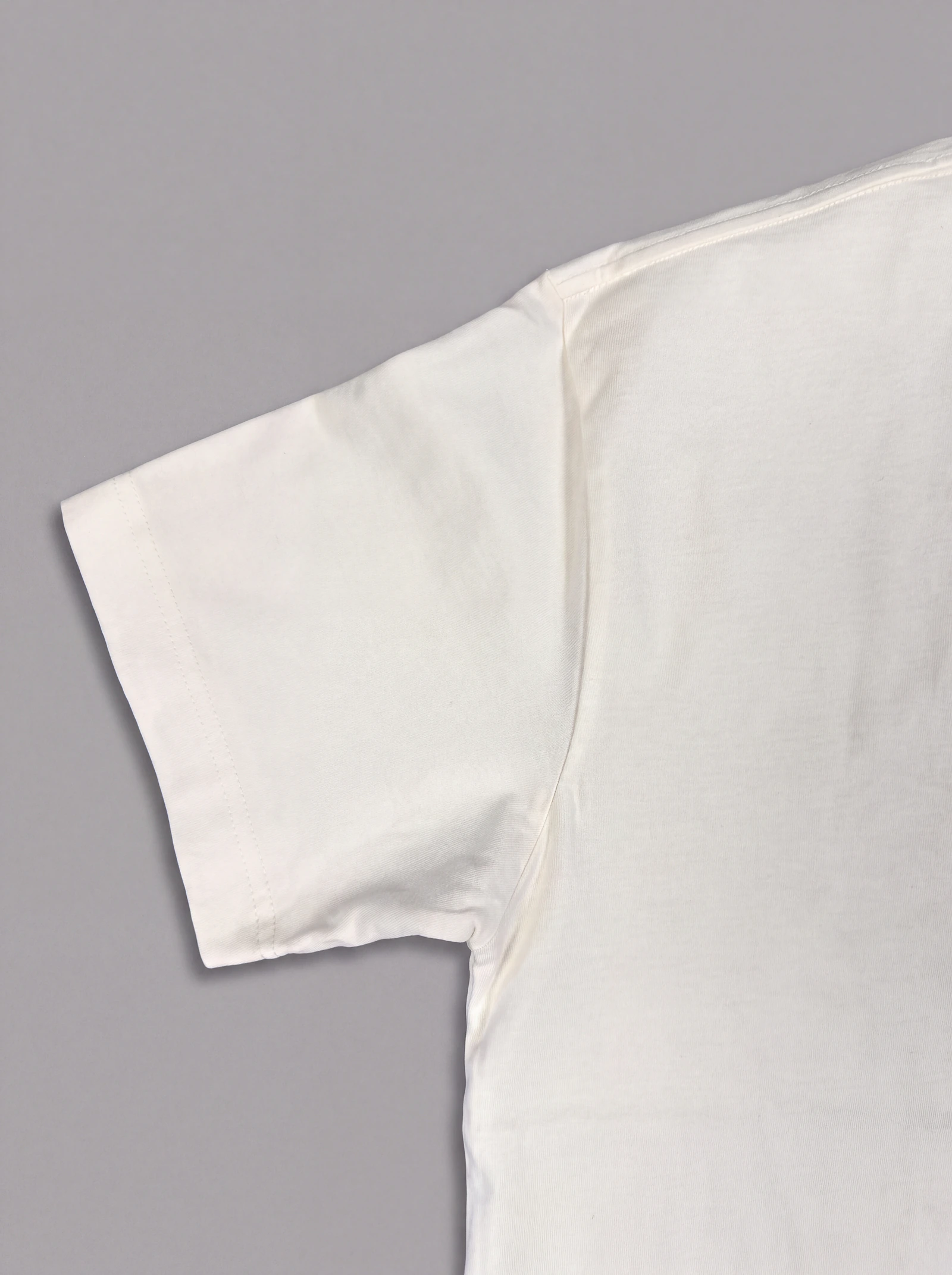 Camiseta Oversize Crudo — detalle: manga