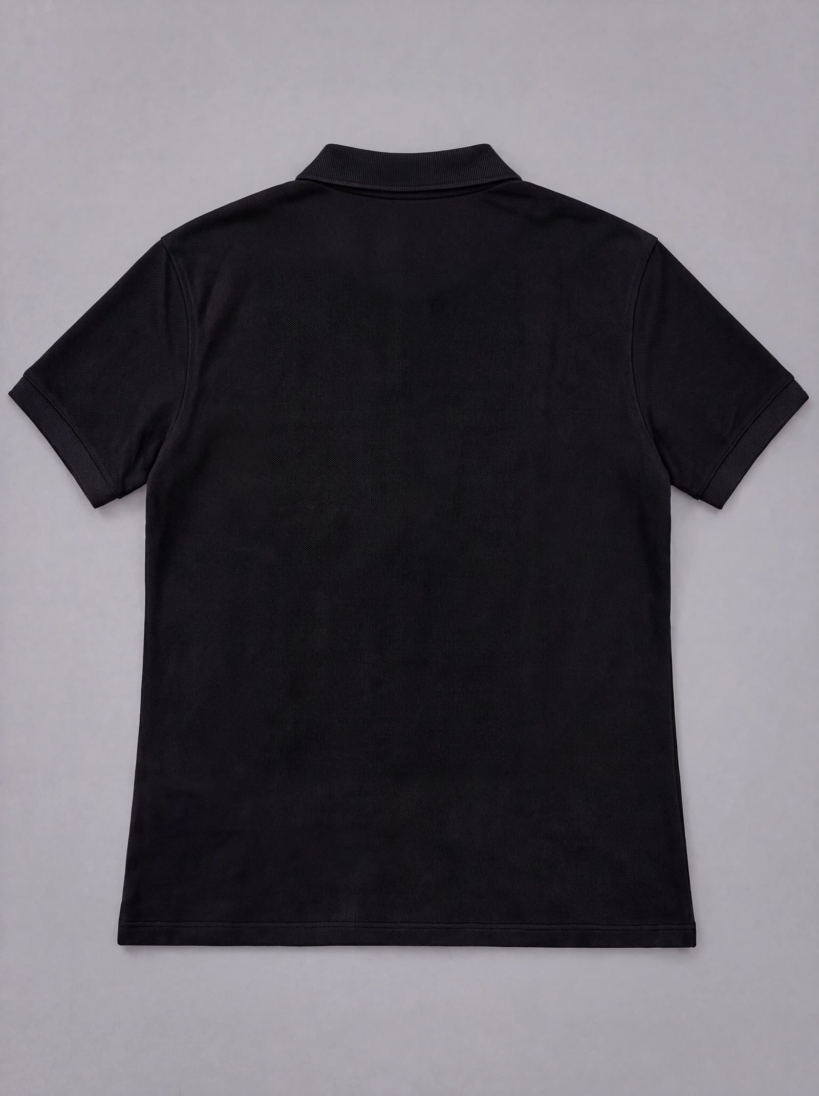 Polo Negro — espalda